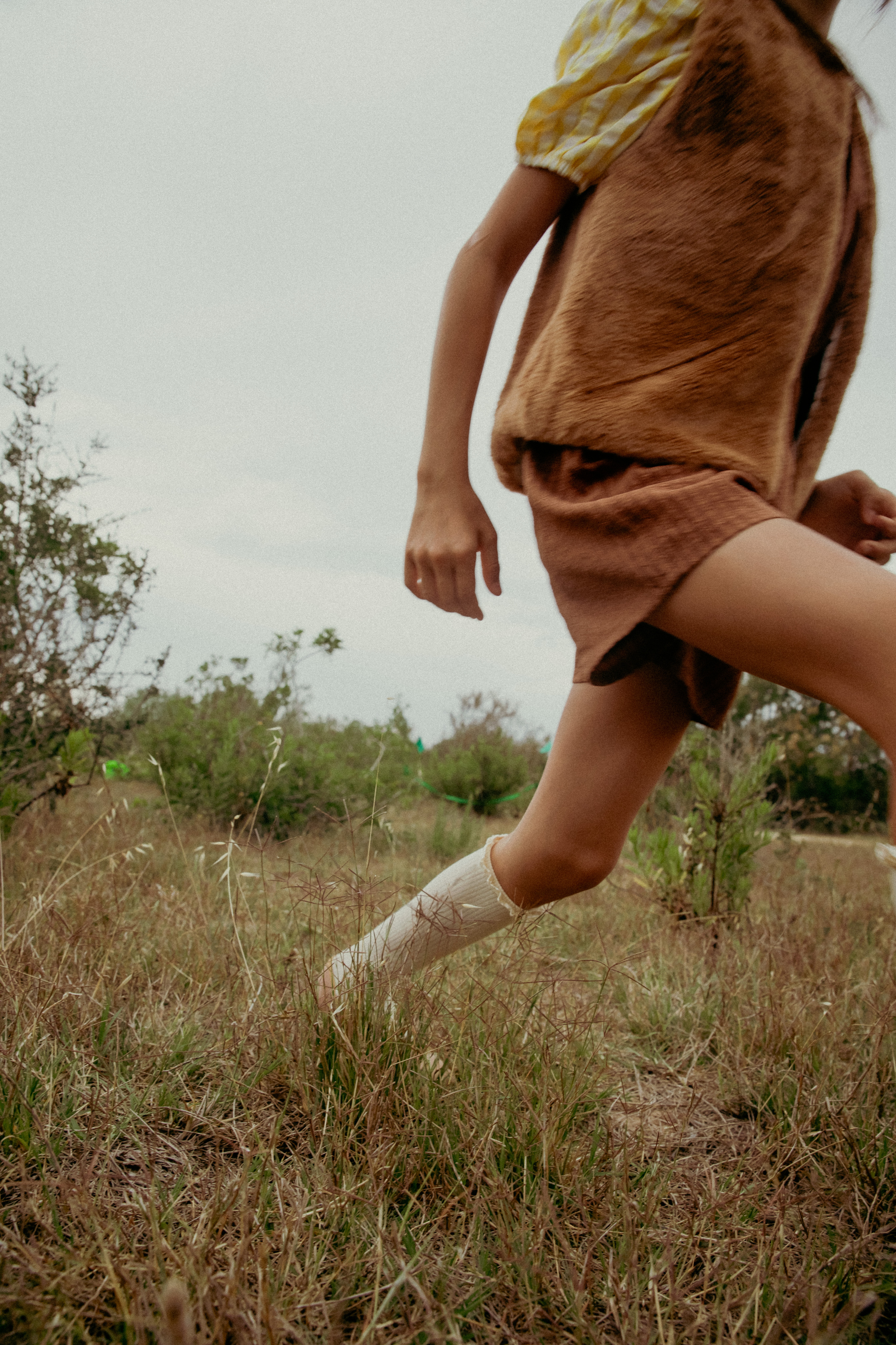 Kid Walking in the Field